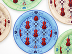 Three colors of 9-inch cello paper plates